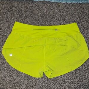 Lululemon highlighter yellow speed up shorts 2.5” size 4